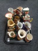 A tray containing assortment of Toby jugs.