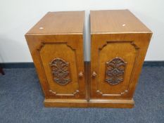 A pair of Edwardian oak desk pedestals