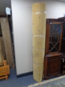 A row of yellow patterned carpet.