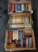 Three boxes of 20th century hardback and paperback books to include Penguin, Charles Dickens,