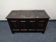 An Edwardian oak panelled blanket box.