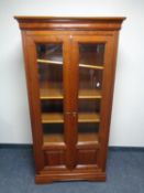 An Ernest Menard double door vitrine cabinet