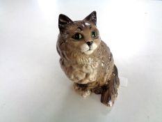 A Beswick figure of a cat,
