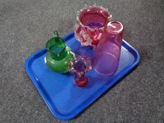 A tray containing four pieces of antique glassware to include a hand painted green glass jug,