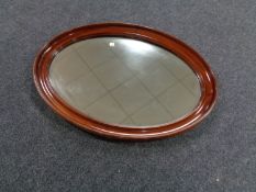 Two antique oval mirrors