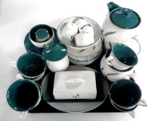 A tray of thirty-five pieces of Denby Greenwheat tea and dinner china