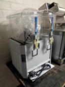 A twin electric counter top drinks dispenser