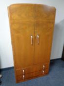 A 1930's walnut gentleman's wardrobe