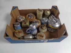 A box containing a collection of table lighters to include onyx and Wedgwood examples.