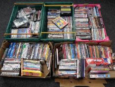 Five boxes containing assorted DVDs.