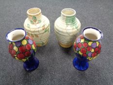 A pair of Kensington pottery ribbed vases together with a further pair of Barker Brothers vases