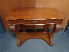 A mahogany Duchess style dressing table (lacking mirror)