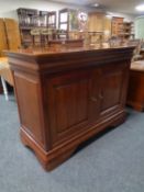 An Ernest Menard double door sideboard fitted two drawers