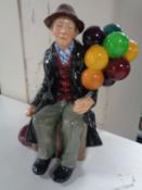 A Royal Doulton figure - The Balloon Man HN 1954
