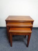 A nest of three contemporary tables