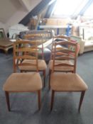 A set of four teak G-Plan dining chairs