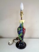 A Moocroft Simeon table lamp on wooden base