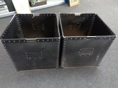 Two laundry bins on wheels