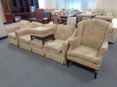 A late 20th century continental four piece lounge suite upholstered in a floral fabric comprising