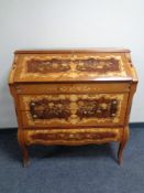 An Italian style fall front writing bureau, fitted two drawers beneath and three internal drawers.