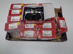 A box containing a quantity of Kwikset door handles.