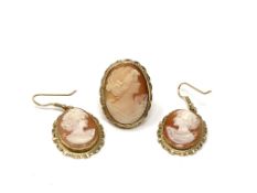 A pair of 9ct gold mounted cameo earrings togehter with a matching ring.