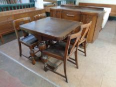 A 1930's oak six piece dining room suite