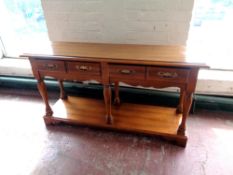 A contemporary American style two-tier side table