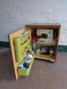 A Bernina minimatic 807 electric sewing machine in cabinet together with a large quantity of sewing