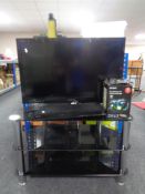 A Sony Bravia ADL-32 EX 732 TV with remote, Sony Blu Ray disc player with remote,