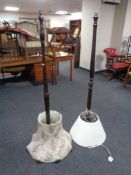 Two standard lamps with shades.