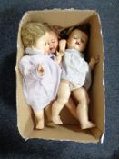 A box of three mid 20th century plastic dolls