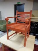 An early 20th century painted armchair.