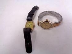 A gent's vintage 9ct gold cushion shaped wristwatch,