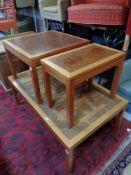 A mid 20th century Danish teak coffee table, lamp table and side table with mosaic patterned top.