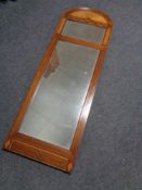 An 19th century inlaid walnut dome topped hall mirror.