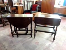 An oak two tier flap sided tea trolley together with a mahogany gateleg table