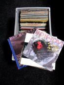 A box of vinyl LP's and 12