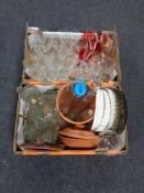 Two boxes containing a large quantity of assorted drinking glasses, oil bottles,