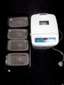 A table top Philips four pot bain marie and a Belling bread maker