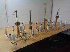 Four brass light fittings