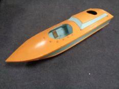 A 20th century painted wooden model boat.