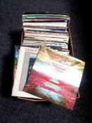 A box of vinyl LP's and 12