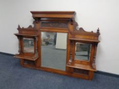 A 19th century oak mirrored sideboard back.