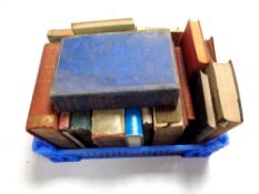 A crate containing 20th century volumes,