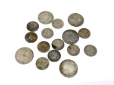 A quantity of George III, George IV and William IV half crowns and shillings.