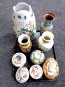 A tray containing 20th century oriental porcelain vases, Turkish enamelled metal vase,