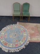 Two pairs of metal framed stacking banqueting chairs