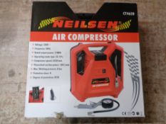 A boxed Neilsen air compressor
