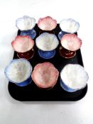 A tray containing nine Maling lustre sundae dishes.